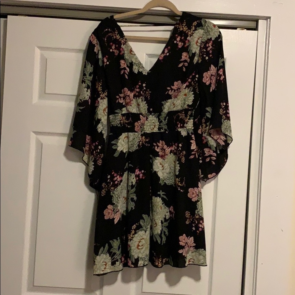 a beautiful floral black sterch waist dress